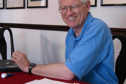 John at his desk